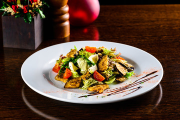 Baked Eggplant Plate Dressed with Parsley and Tomato
