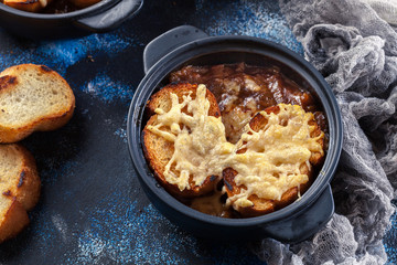 Delicious onion soup with croutons and cheese