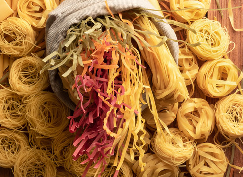 different types, colour of pasta and geometric shape on  top view