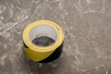 Black-yellow tape on the table.
