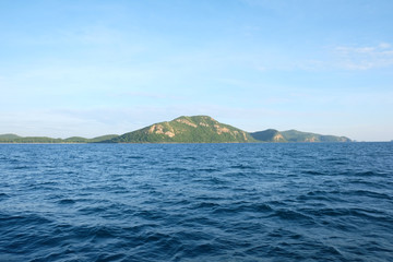 Fototapeta na wymiar Samaesarn Island in daytime view and blue sky.