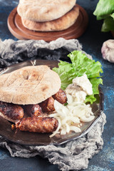 Cevapcici or cevapi served with lepinja bread