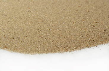 Beach sand on white