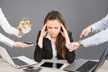 Female office worker is tired of work and exhausted.