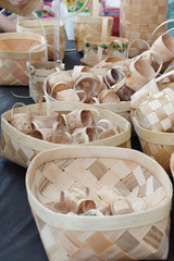 Many wicker baskets with handles made of wooden materials made by hand