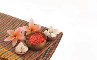 Thai fabric and bowl of water on songkran day isolated on white background