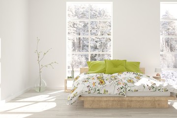 White stylish minimalist bedroom with winter landscape in window. Scandinavian interior design. 3D illustration