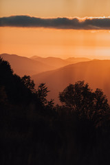 Beautiful landscape with mountains with yellow sunlight in sunrise. backgrond, desktop
