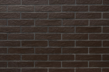 glossy brown brick wall