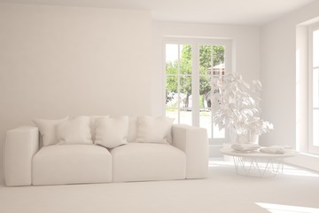 Stylish room in white color with sofa and green landscape in window. Scandinavian interior design. 3D illustration