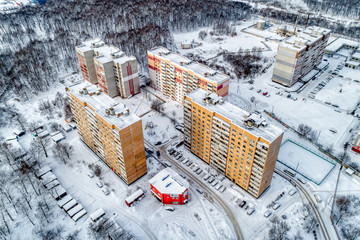 View of the city from the air. Winter cityscape