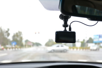 video camera recorder inside car driving rainy day
