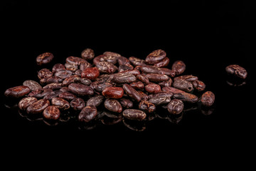 Cocoa beans  isolated on black background. Roasted beans. 