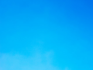 Blue sky background and white clouds soft focus, and copy space