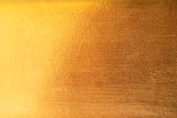 Naklejka premium Gold abstract background or texture and gradients shadow