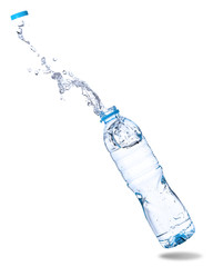 Water splash out of bottle isolated on white background.