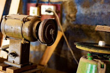 old grinding machine with grinding wheel