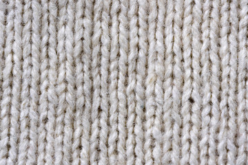Hand-knitted wool knitted fabric close-up