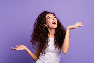 Close up photo beautiful amazing her she lady scream yell shout look up empty space both arms show products higher lower wear casual white t-shirt clothes outfit isolated violet purple background
