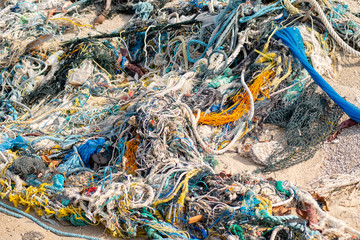 old tangled sea nets on the shore.