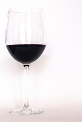 Glass of red wine with white background