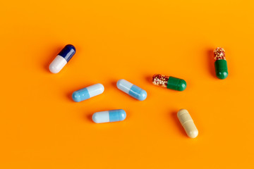 Blue and green medicine capsules