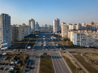 Aerial panoramic view from drone to Kharkivskiy district with modern building of the city Kiev ukraine in a sunny spring day.