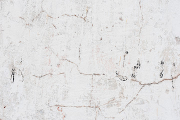Wall fragment with scratches and cracks