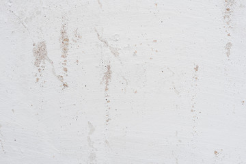Wall fragment with scratches and cracks