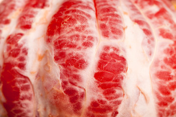 peeled red grapefruit