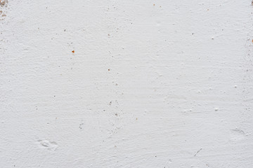 Wall fragment with scratches and cracks