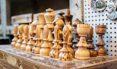 Souvenir olive wood chess for sale at old market. Jerusalem. Israel