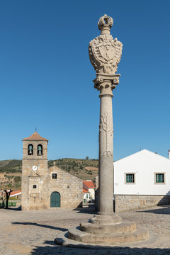 Portuguese Pillory and Church and bell tower from the 17th century