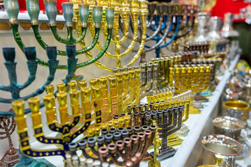 Menorah, a seven-lamp candelabrum used in contemporary Jewish temples, for sale at old market. Jerusalem. Israel