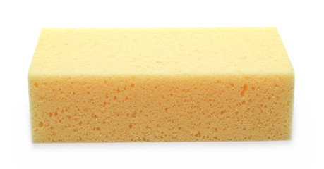 Yellow sponge for cleaning isolated on white background