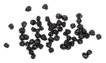 Dried aronia berries isolated on white background, top view
