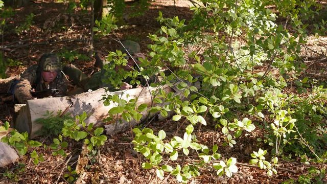 WW2 &ndash; SS Soldiers with machine gun in a forest