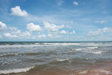 Beautiful Sea with Blue Sky and White Clouds