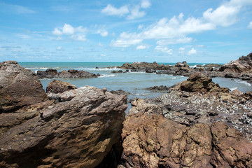 Beautiful seascape. Sea and rock at the blue sky