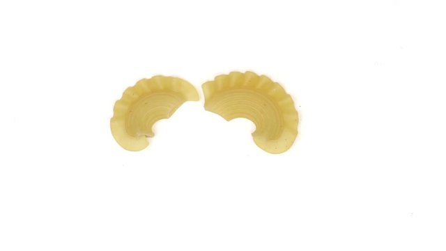 Moving pasta on white background. 4K stop motion animation.