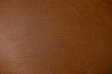 Texture of genuine leather close-up, brown color print. For your background, backdrop, with copy space 