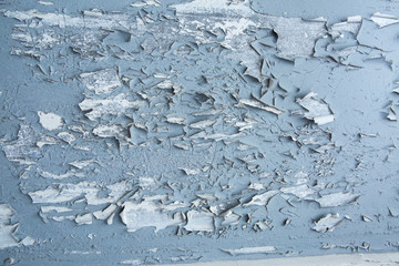 Concrete wall with peeling paint. Color abstract texture.