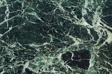 The dark green marble. Facing stone. Texture