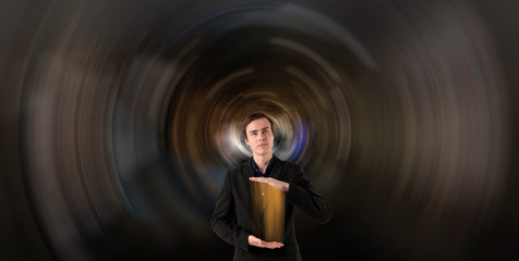 Young scientist on a futuristic background.