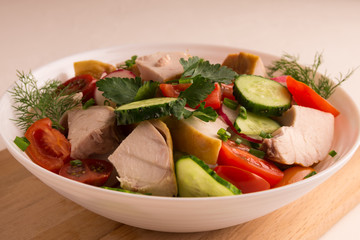 Chicken Breast, Cucumber Radish and Tomato Salad with Greens