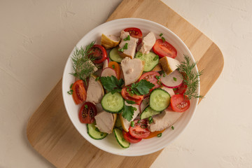 Chicken Breast, Cucumber Radish and Tomato Salad with Greens