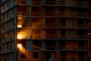 construction of the building cranes in the strongest light, otherwise