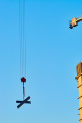 construction of the building cranes in the strongest light, otherwise