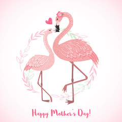 Cute pink flamingo mom with its baby.