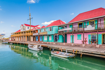 Naklejka premium St John's, Antigua. Colorful buildings at the cruise port.